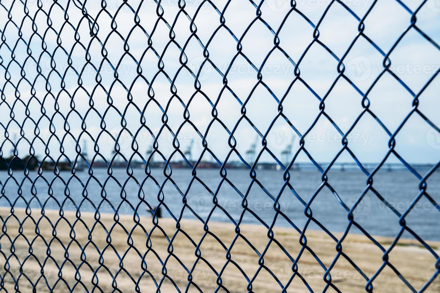 Defocused logistics and security concept of narrow depth of field on gate on port photo