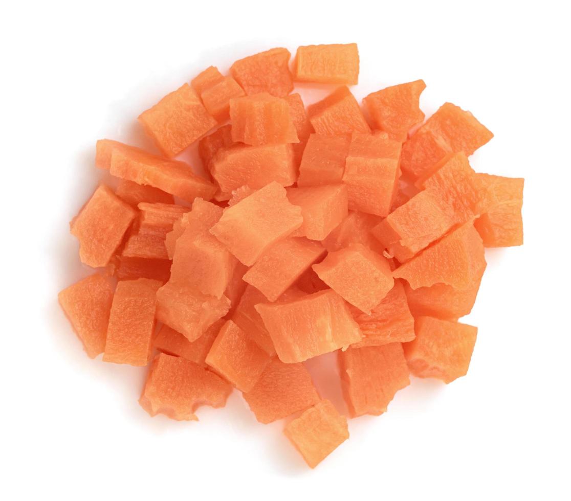 Chopped carrot isolated on white background photo