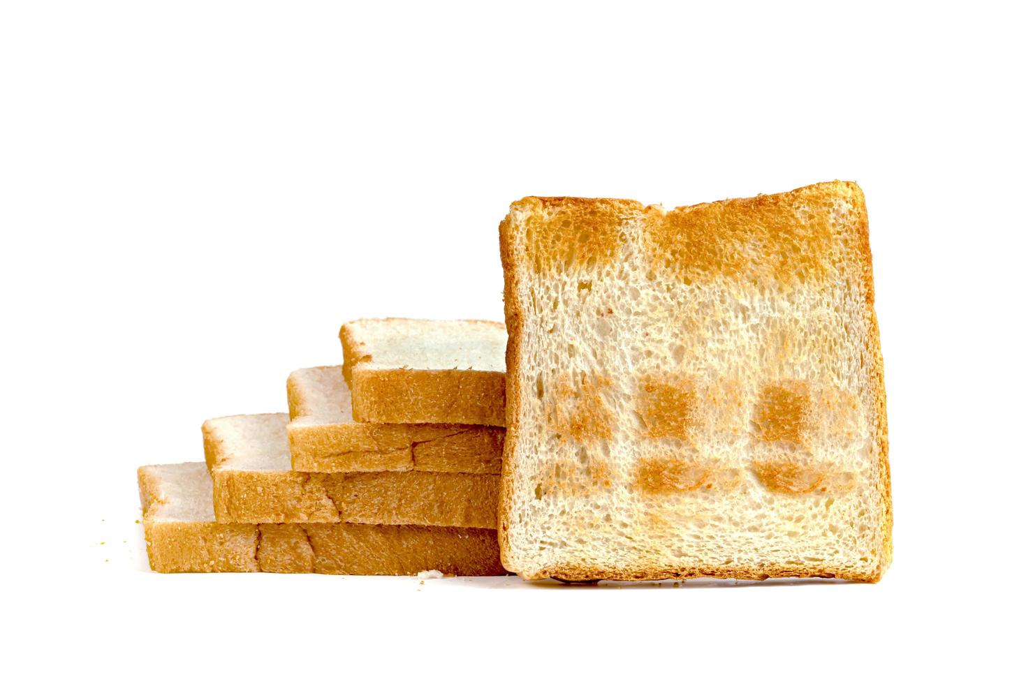 Toasted slice bread isolated on white background photo