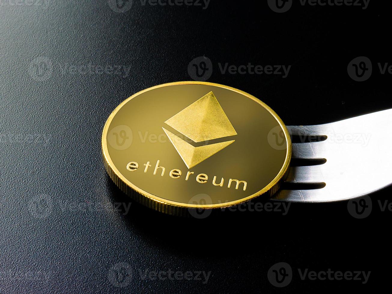 Ethereum coin and  fork  for Hard Fork cryptocurrency concept photo