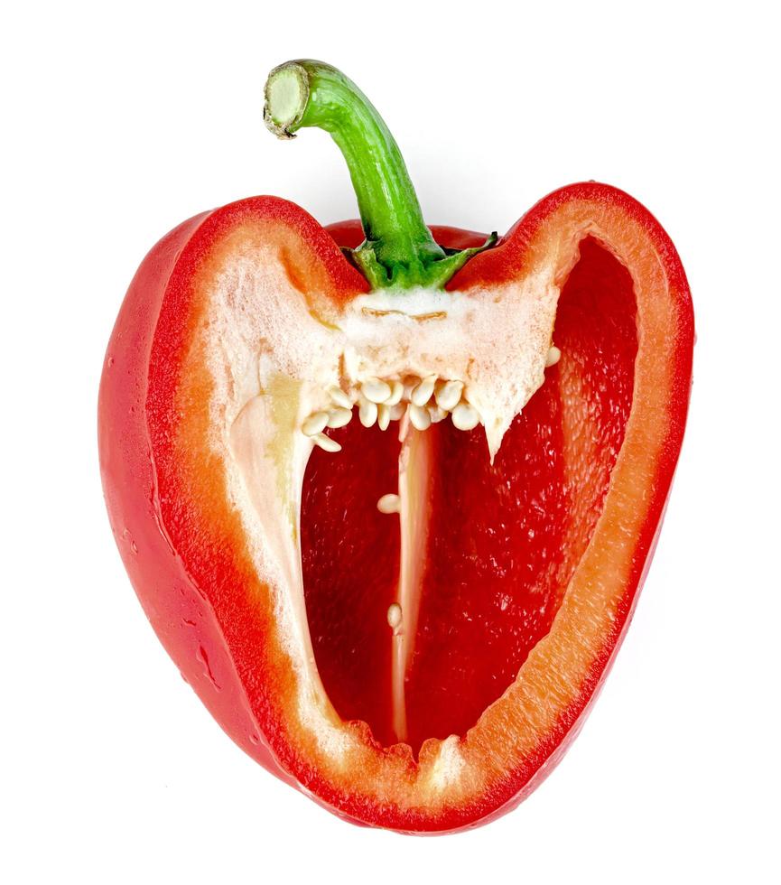 red sweet bell pepper sliced isolated on white background photo