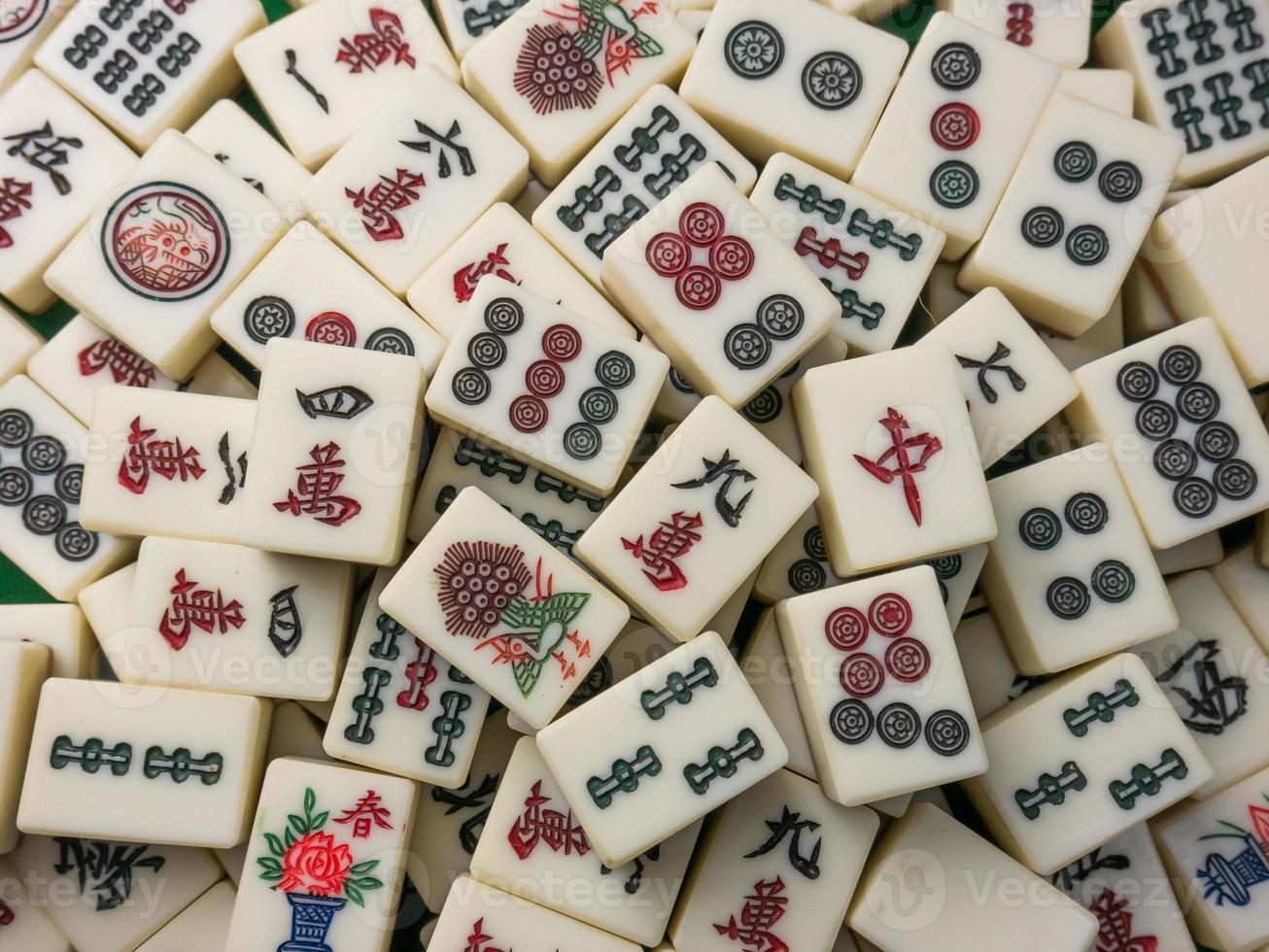 The mahjong on table ancient asian board game close up image photo
