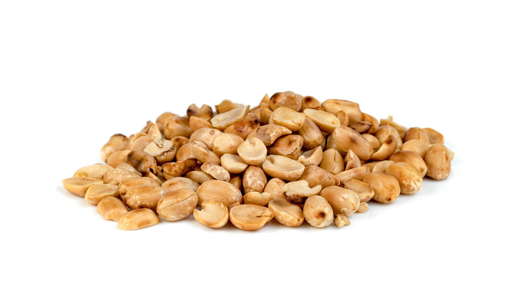 roasted peanuts isolated on white background photo