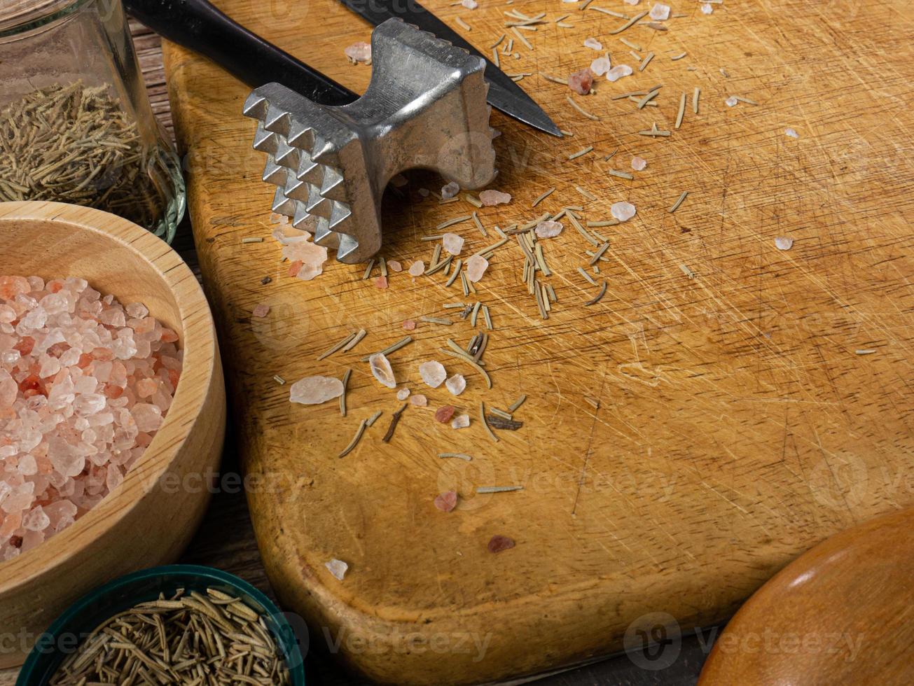 wooden chopping board  and kitchen equipment top view for food concept photo