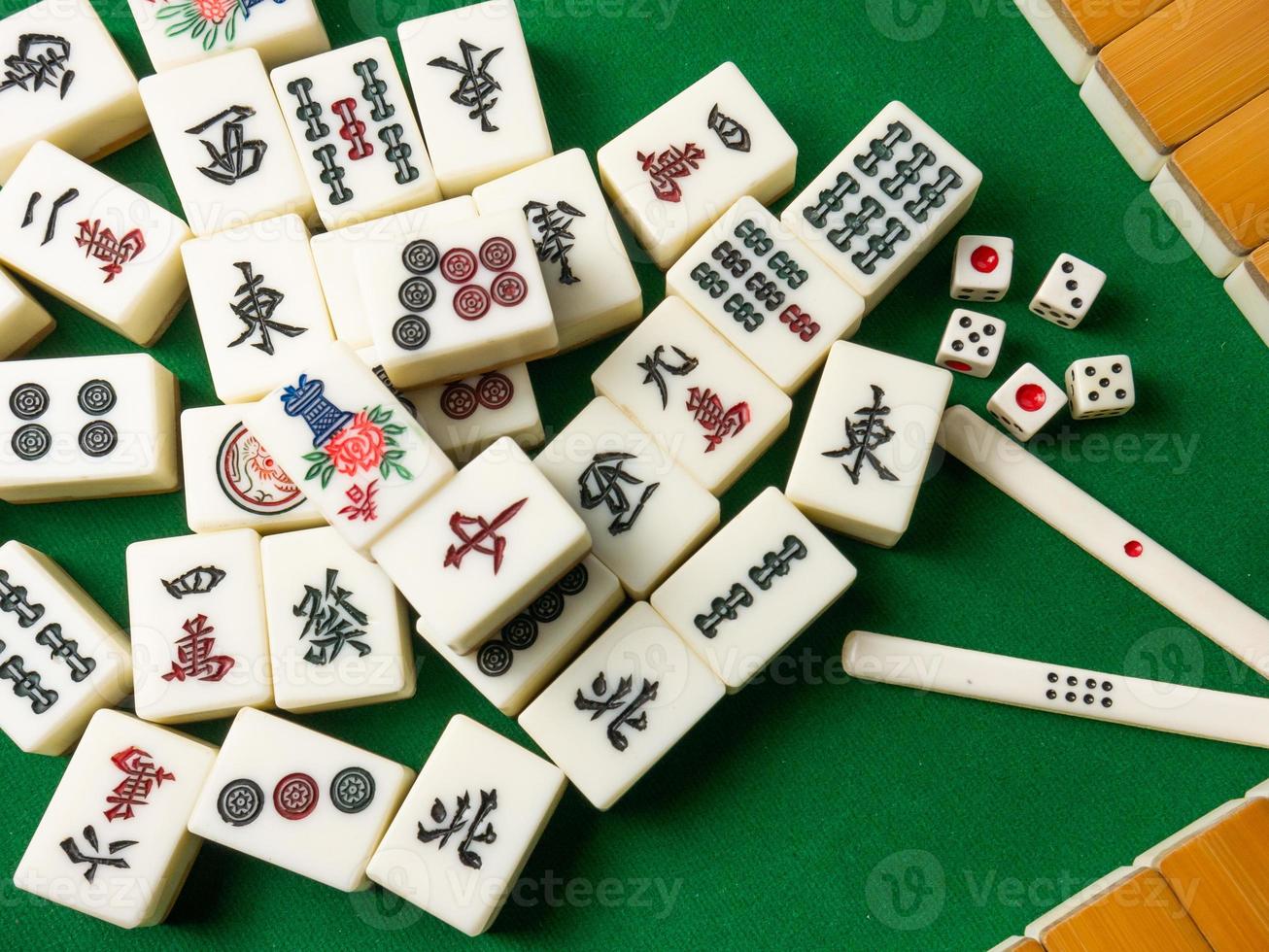 The mahjong on table ancient asian board game close up image photo