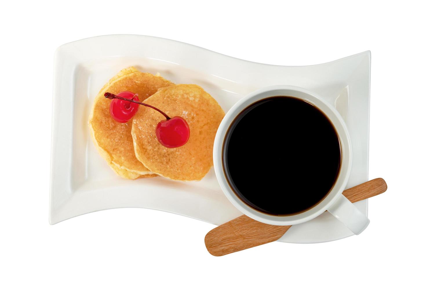 coffee cup with pancakes and cherry isolated on white background ,include clipping path photo