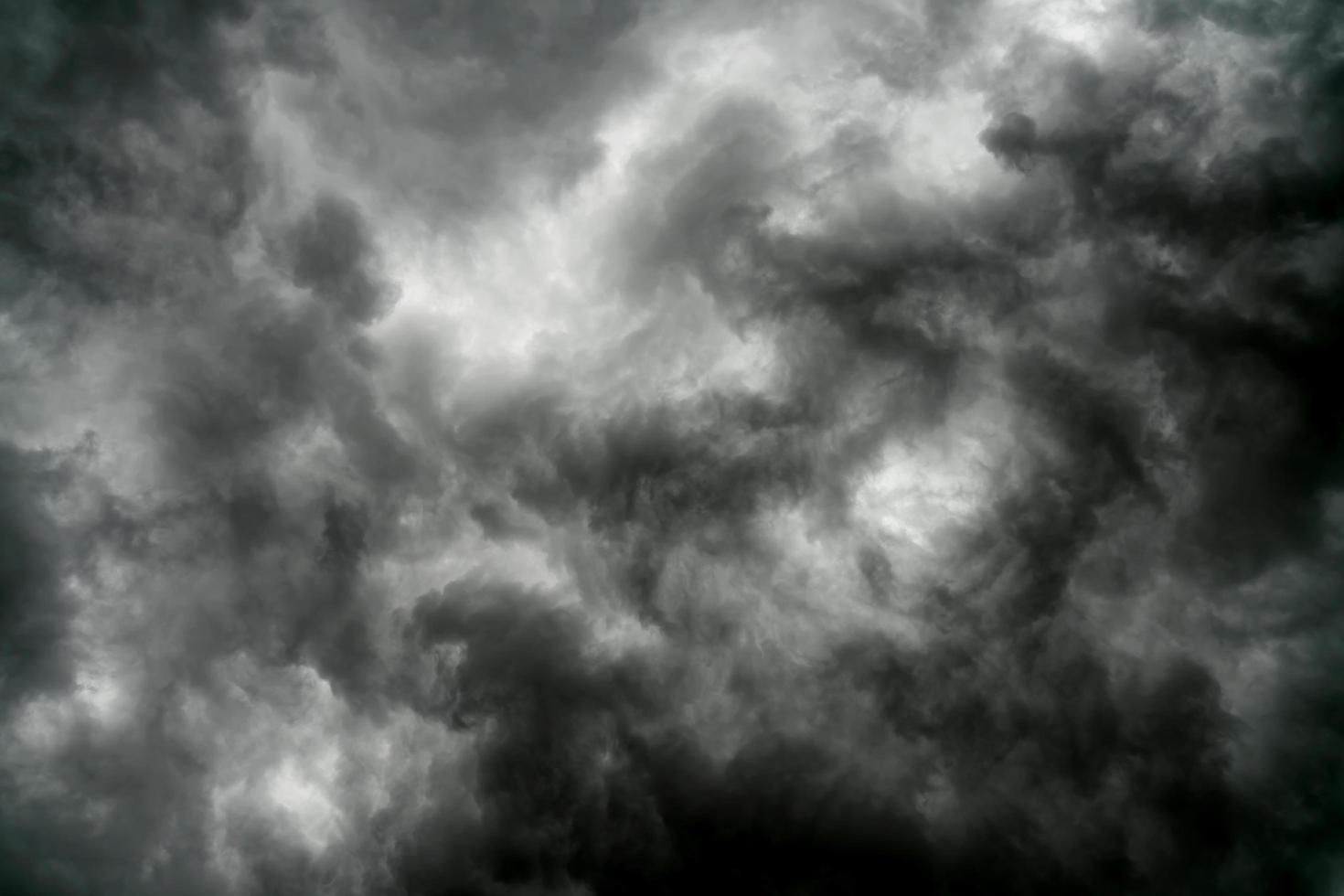 Rain clouds and black sky textured background photo