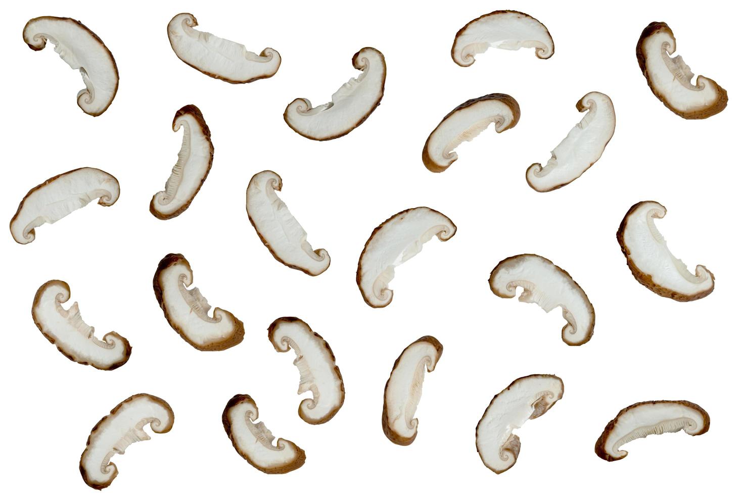 Shiitake Mushrooms sliced isolated on white background photo