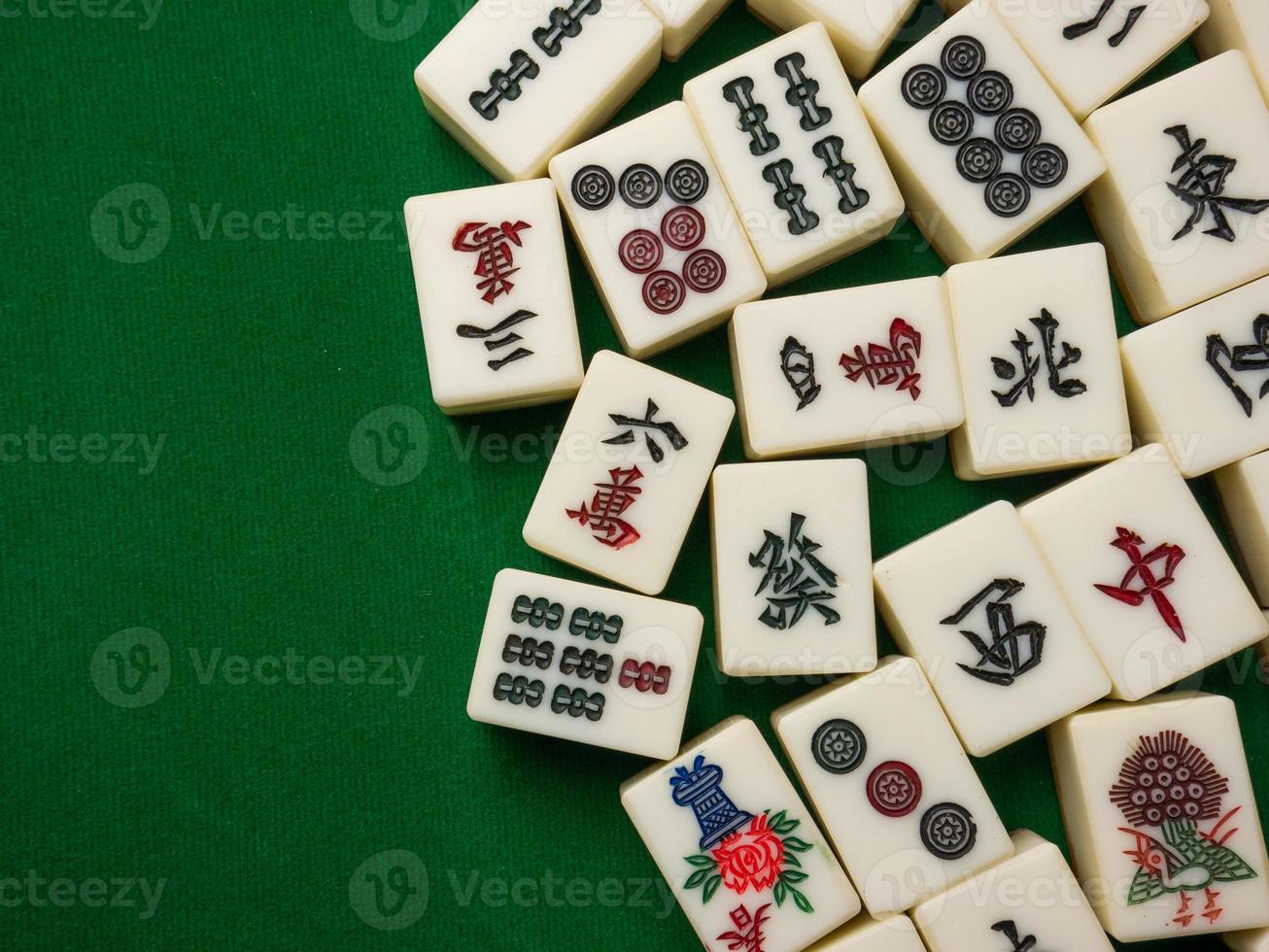 The mahjong on table ancient asian board game close up image photo