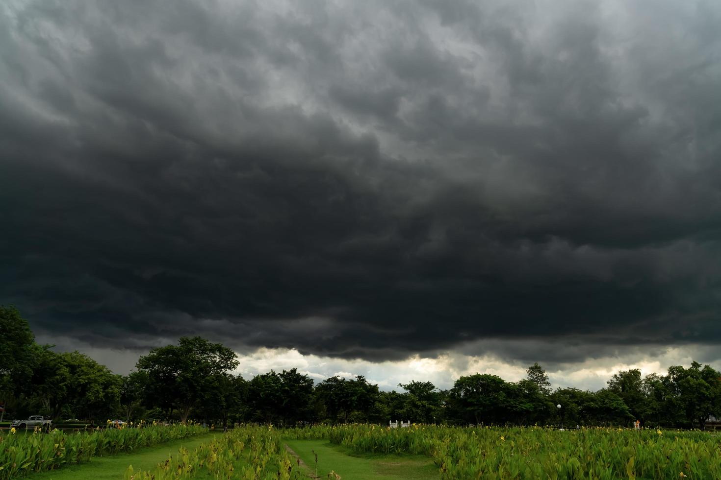 Rain clouds and black sky textured background photo