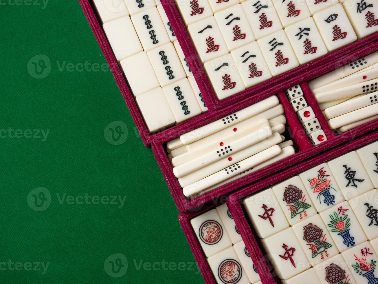 The mahjong on table ancient asian board game close up image photo