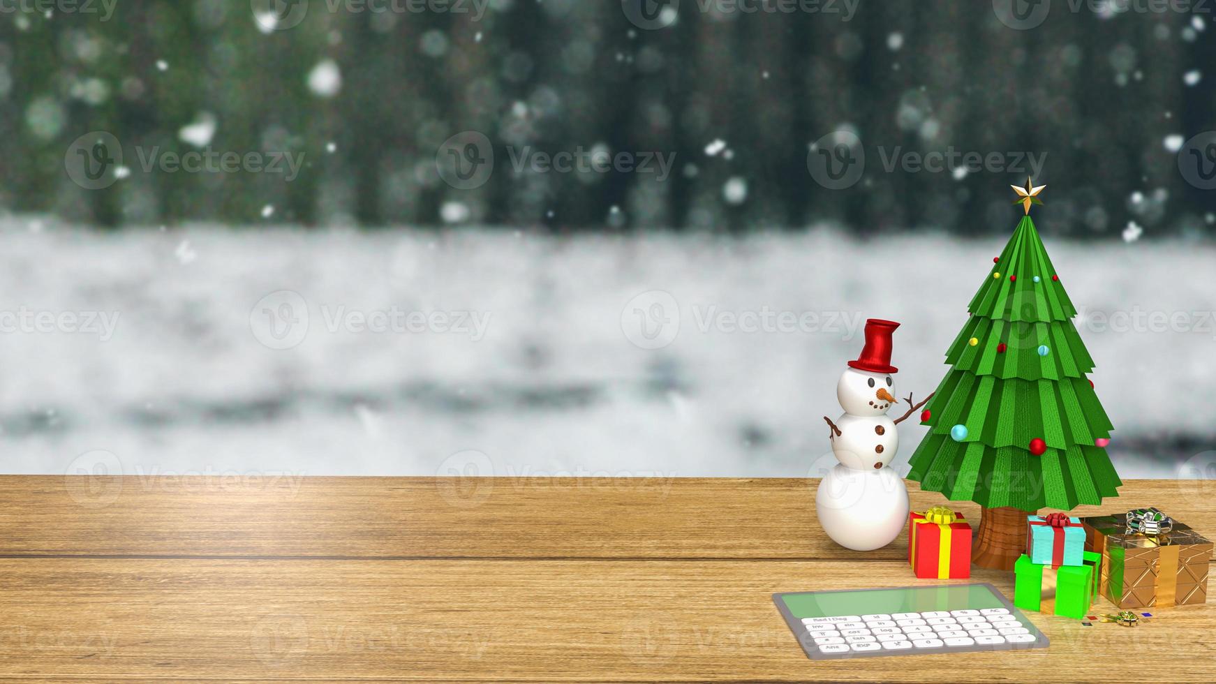 The calculator and Christmas tree on wood table for holiday or business