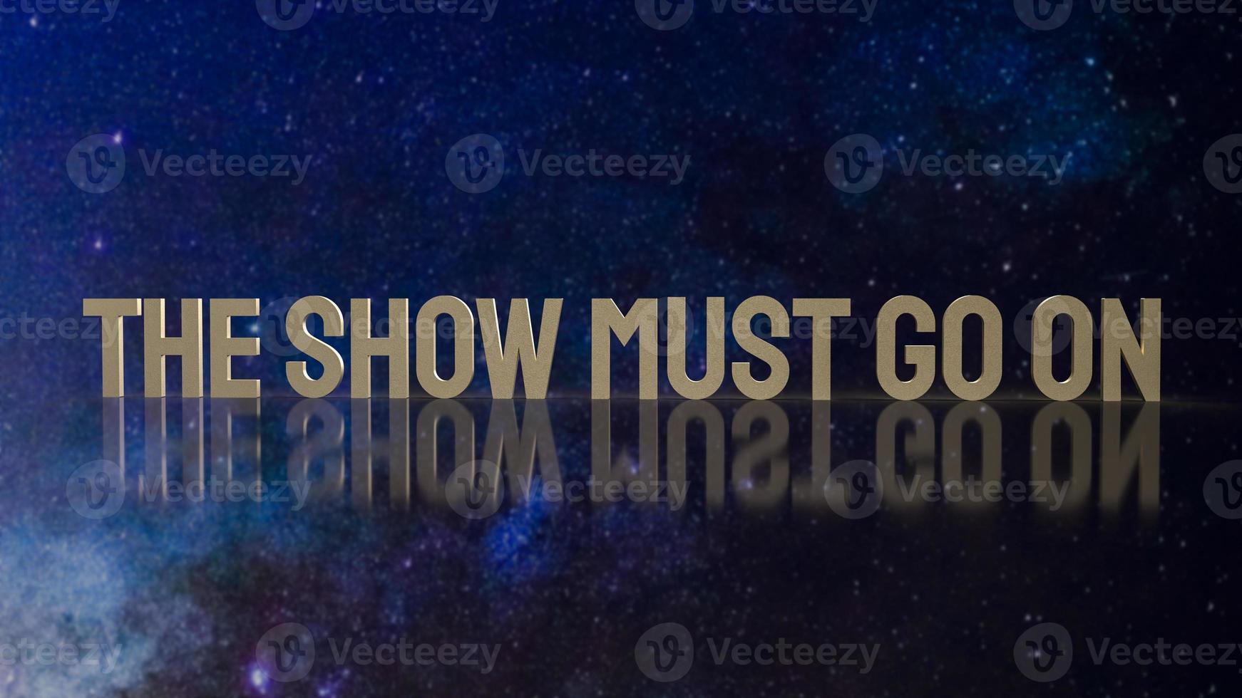 gold text the show must go on for present background photo