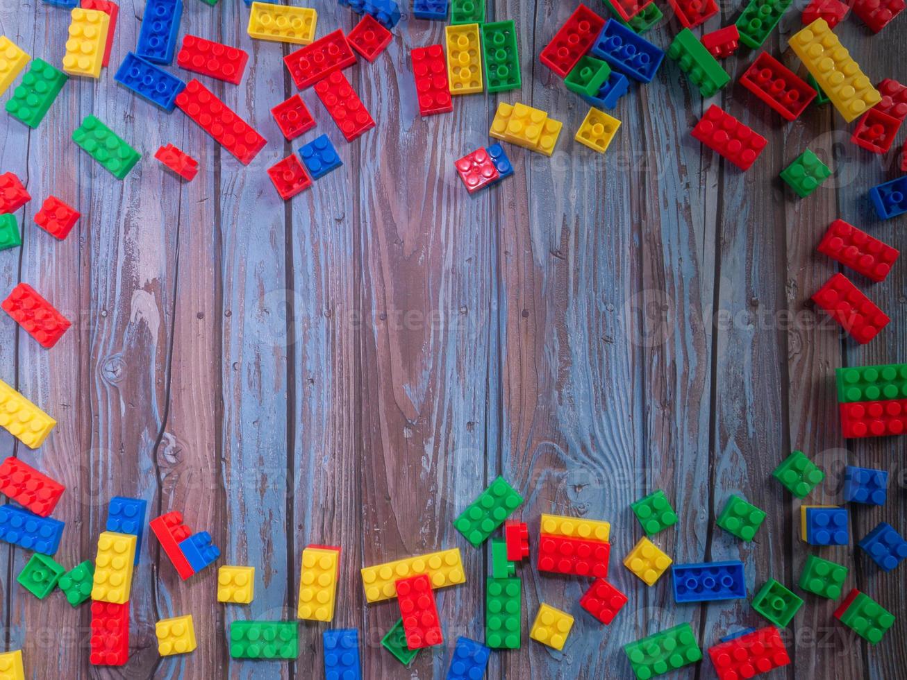 brick toys multi  on wood  for background or education concept photo