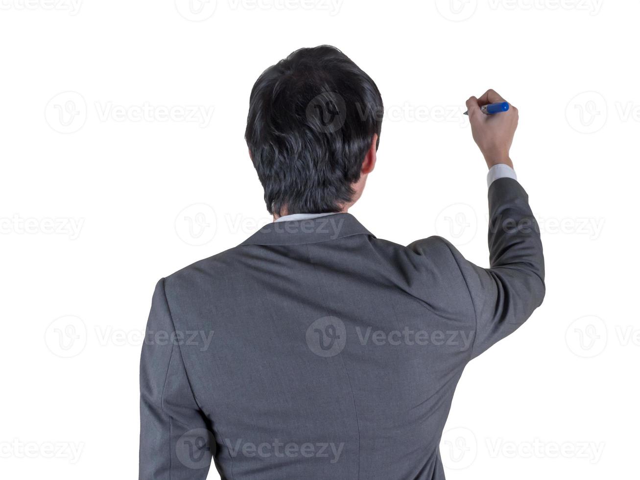 backview of businessman writing with marker on white space. photo