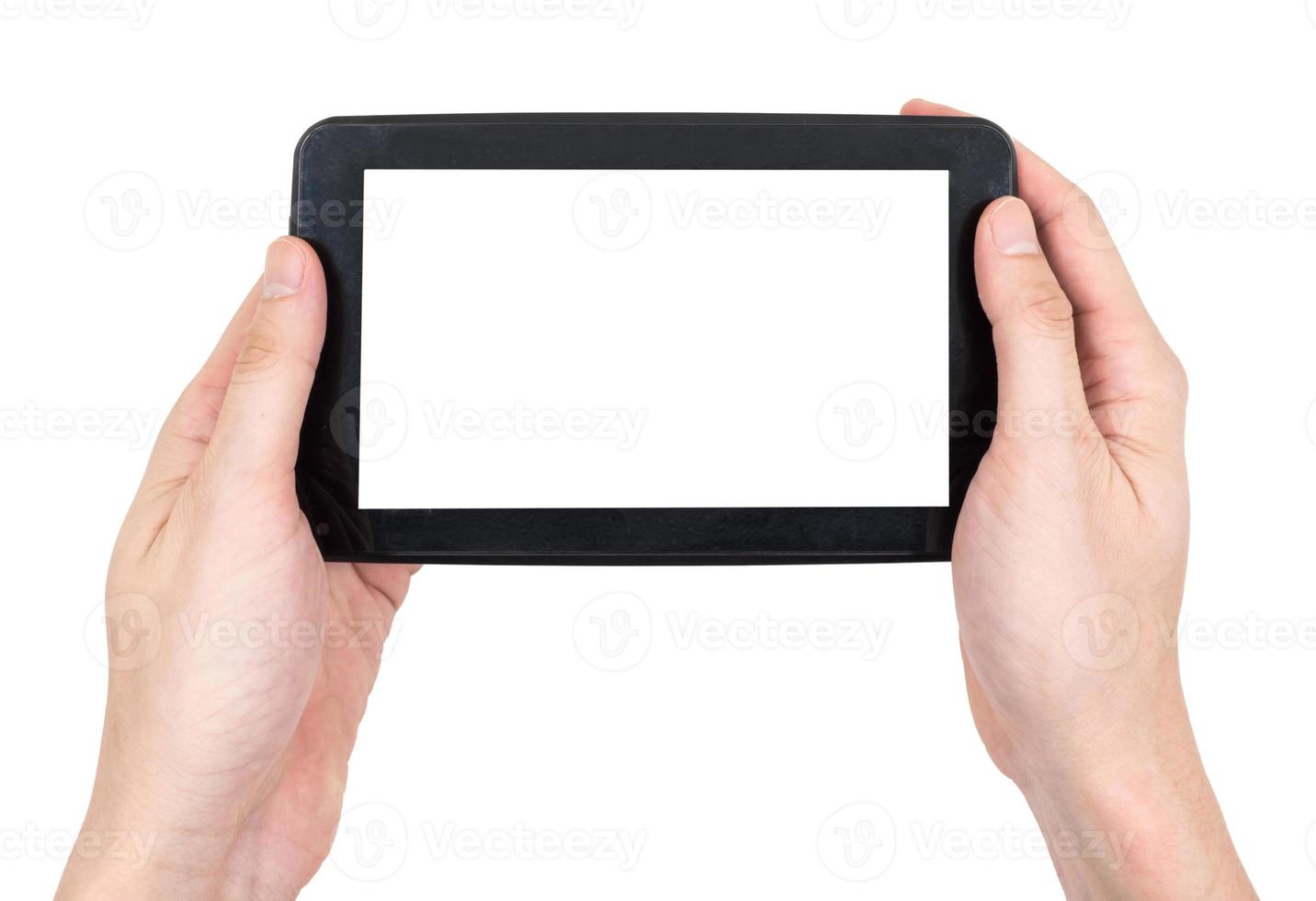Male hands holding a  tablet touch computer gadget with touch blank screen on white background. photo