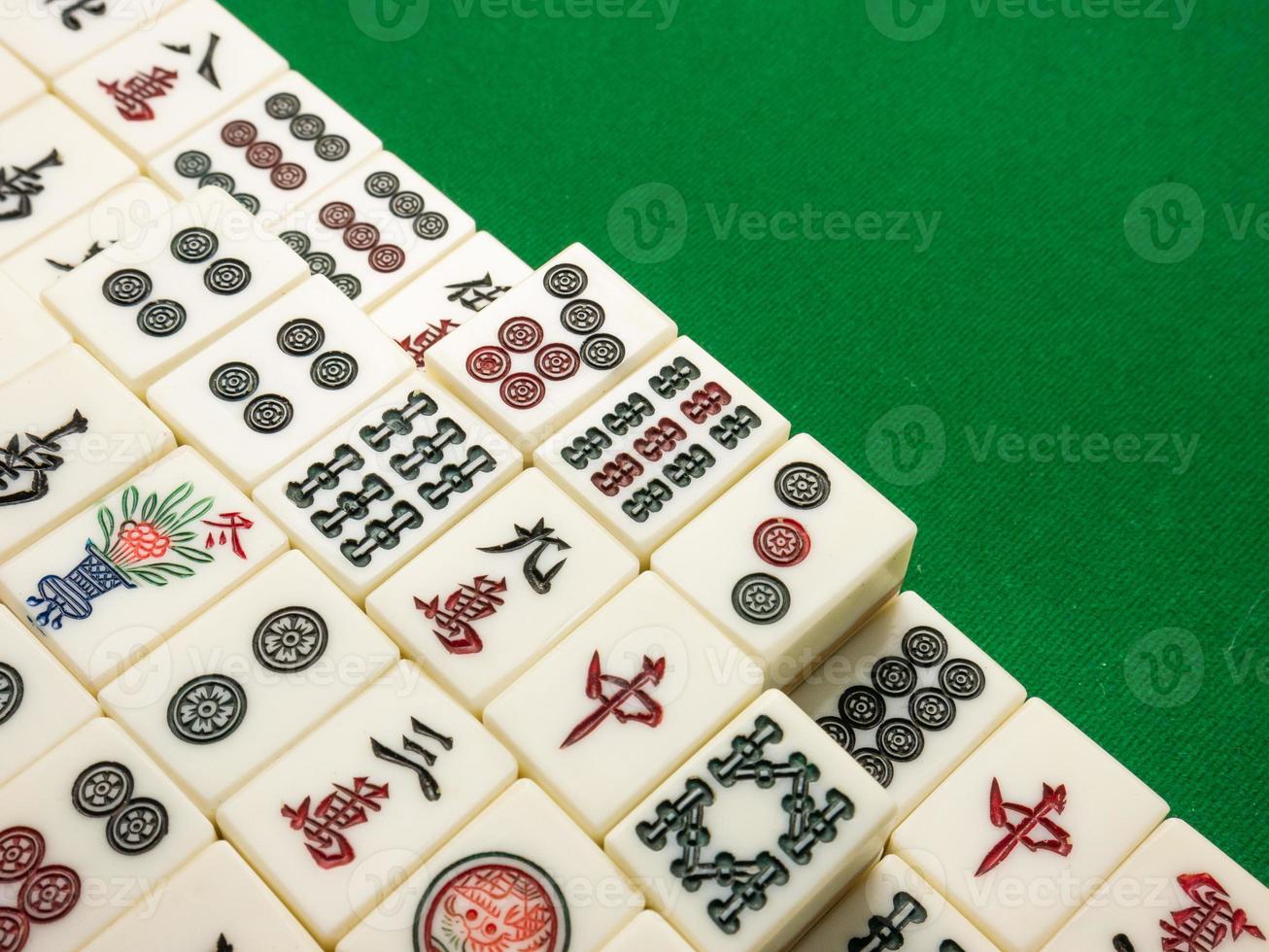 The mahjong on table ancient asian board game close up image photo