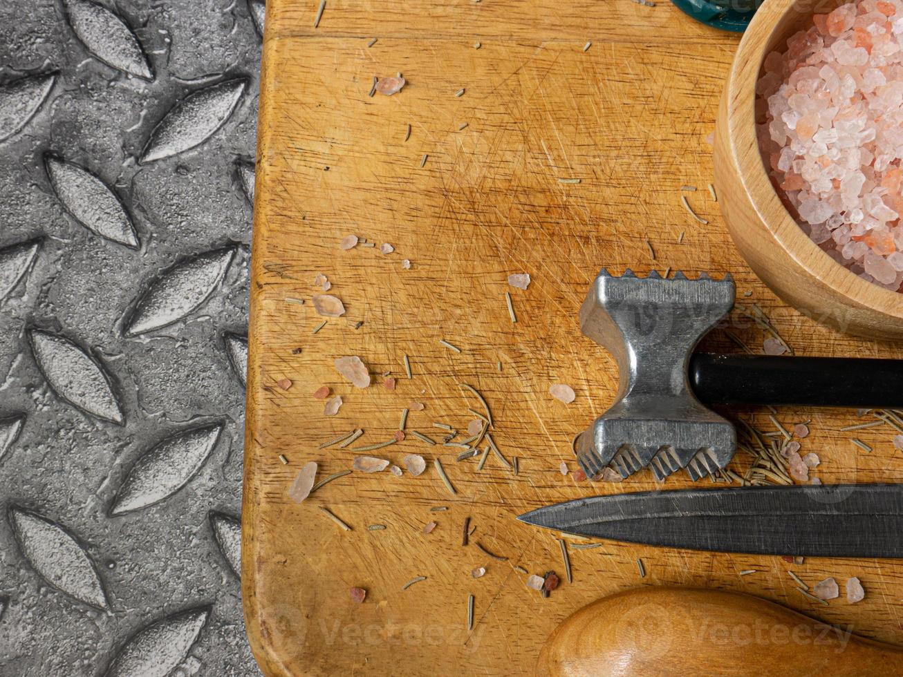 wooden chopping board  and kitchen equipment top view for food concept photo