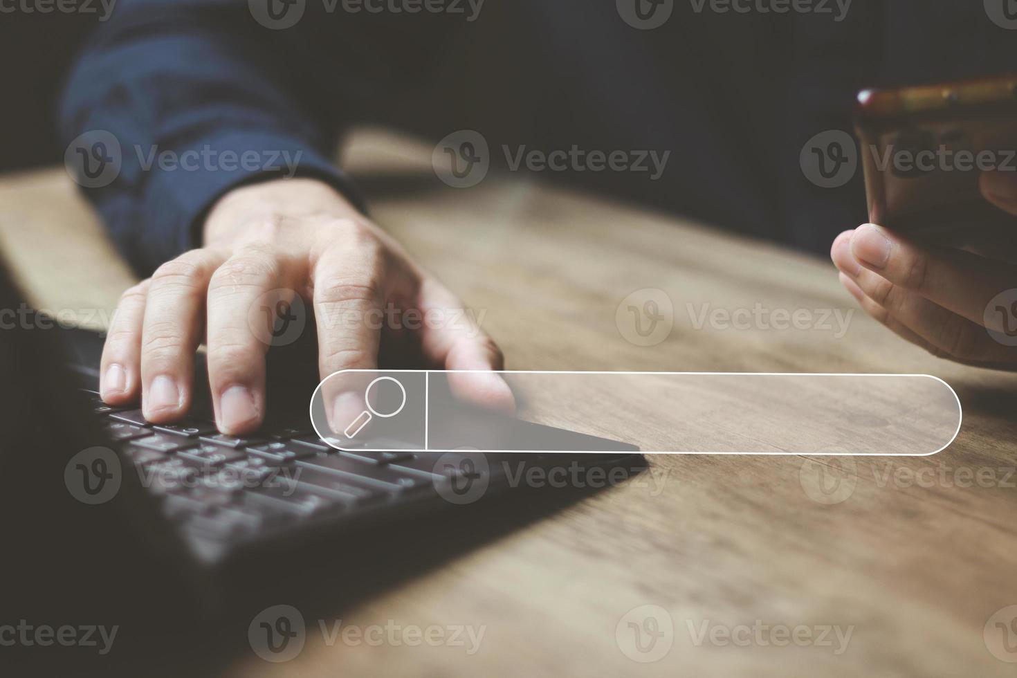 The concept of using technology to search for information, a man's hand is using a smartphone to search for information on social media via the Internet online. photo