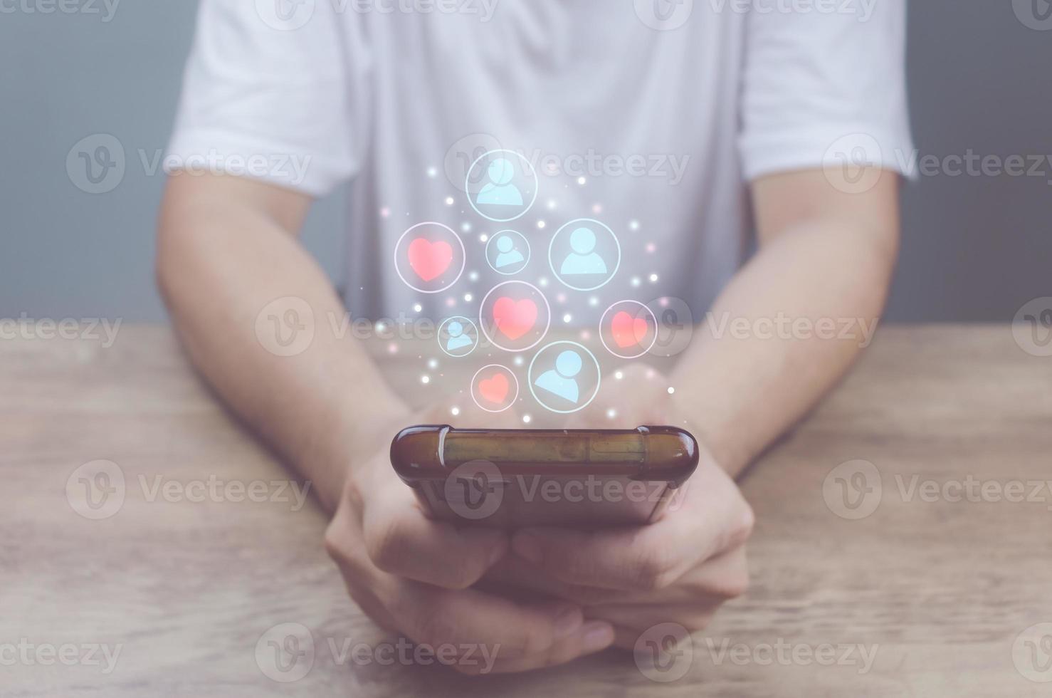 Social media technology concept, man hand using smartphone Login to the online network Use social media to do business and marketing payment from home through the Internet. photo