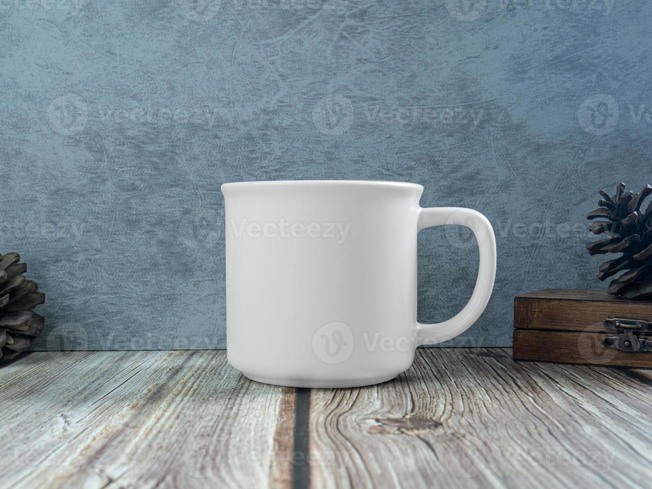 white mug on table wood for mockup or background photo