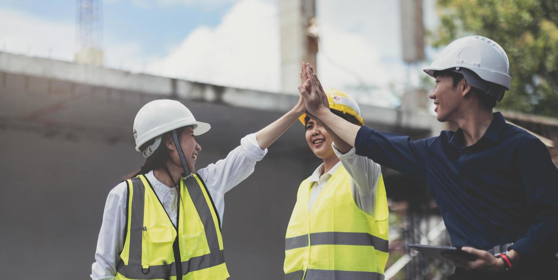 Team job of teamwork engineer work together in a construction site with business concept. photo
