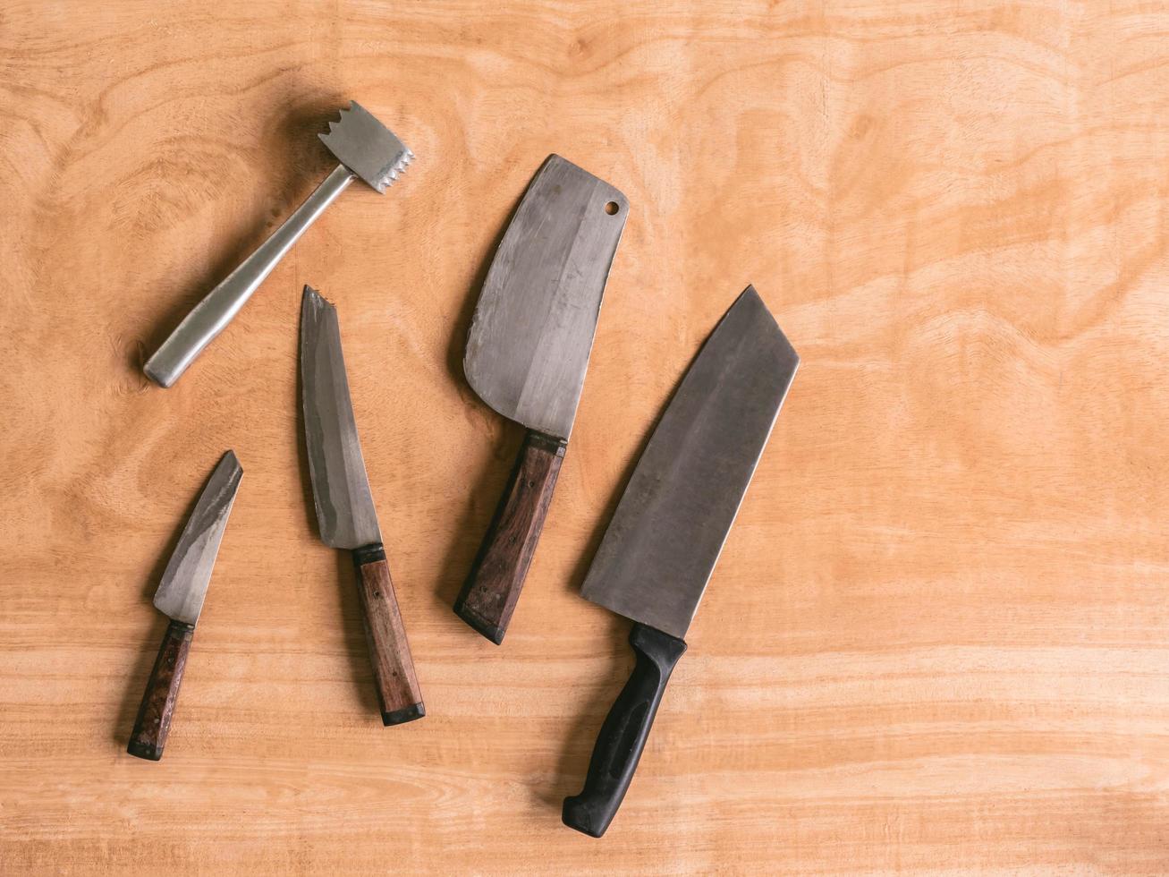 Kitchen utensils on wooden table background. photo