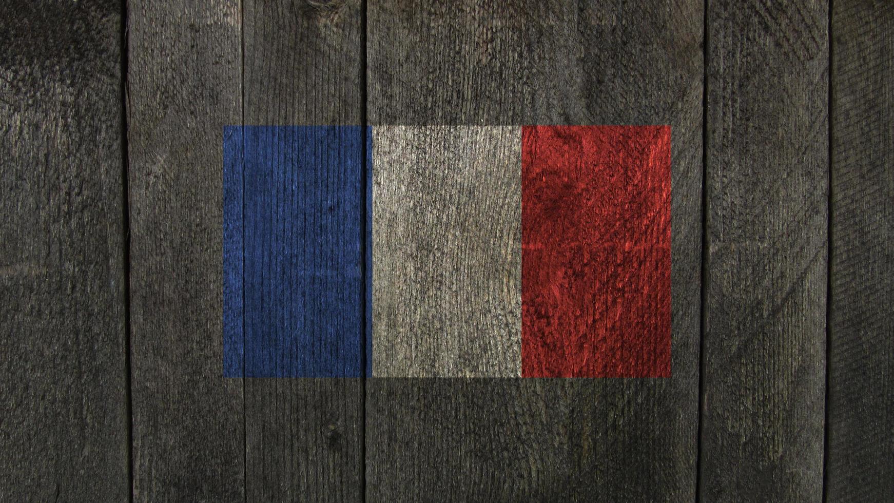 France flag. France flag on a wooden board photo