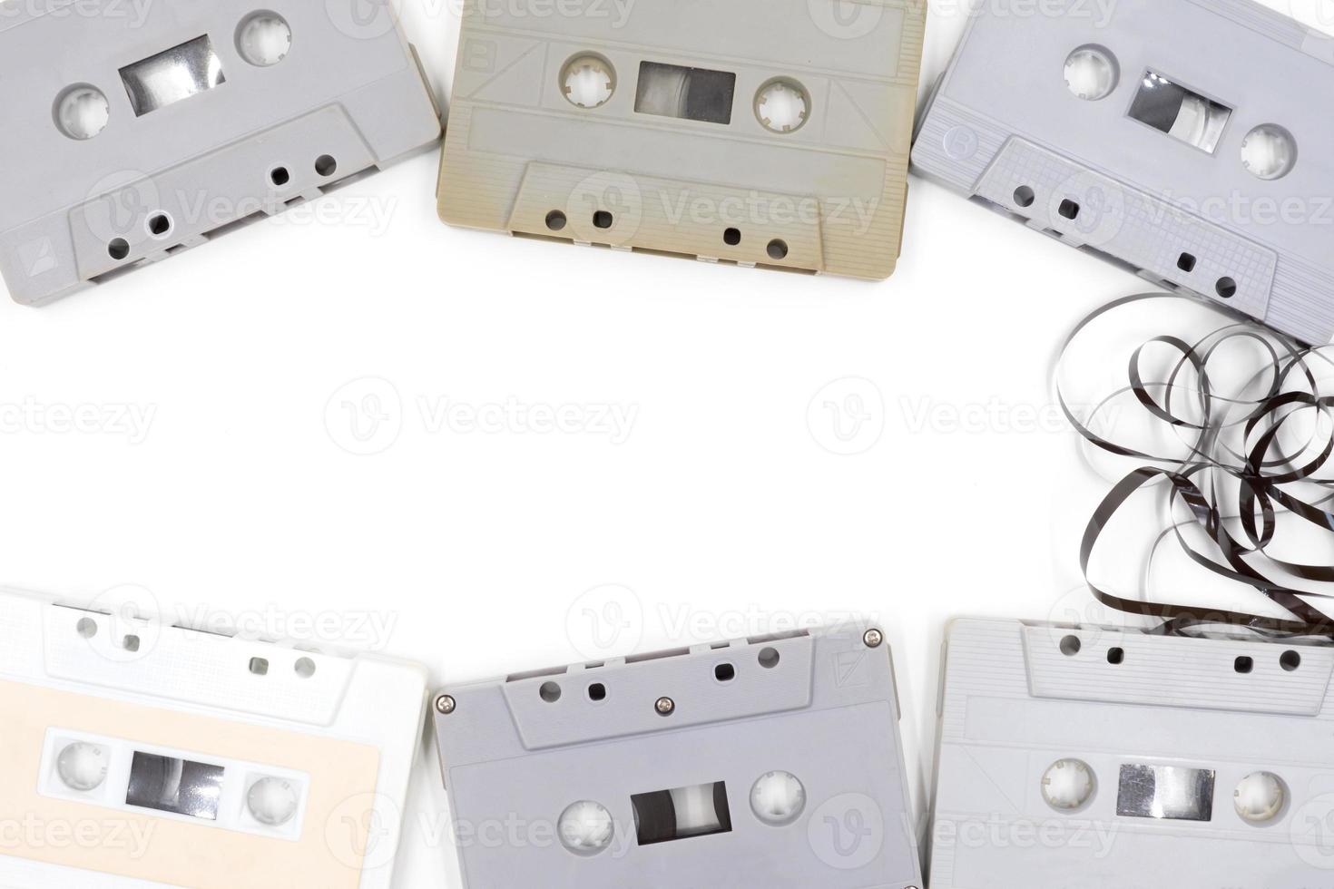 group of old cassette tapes on white background. photo