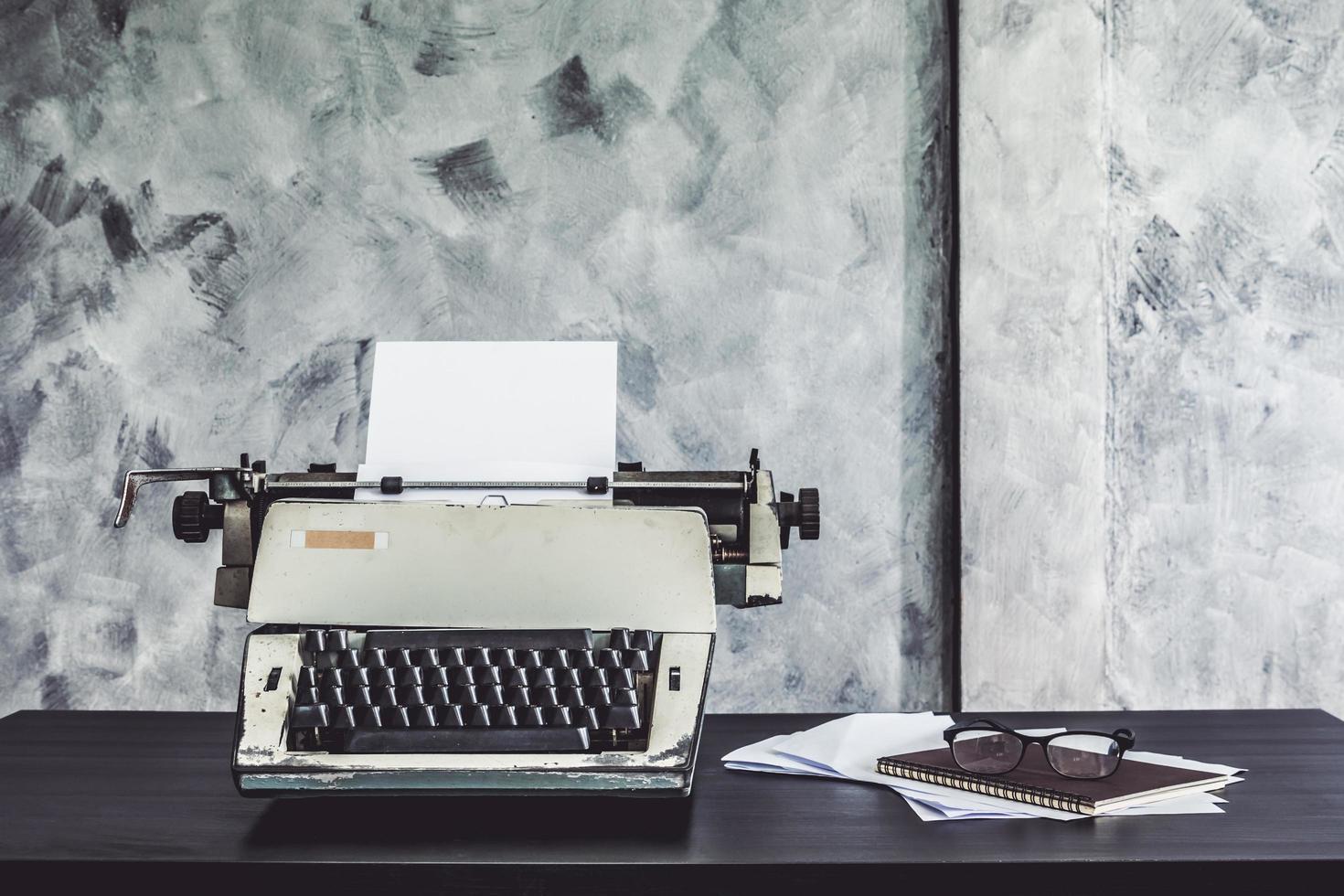 Old Typewriter on the desk. Vintage tone photo