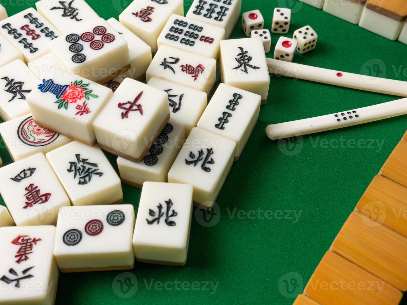 The mahjong on table ancient asian board game close up image photo