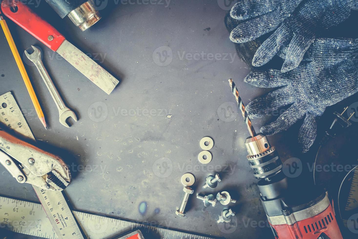 Many Tools on grunge table.View from above. Copy space. photo