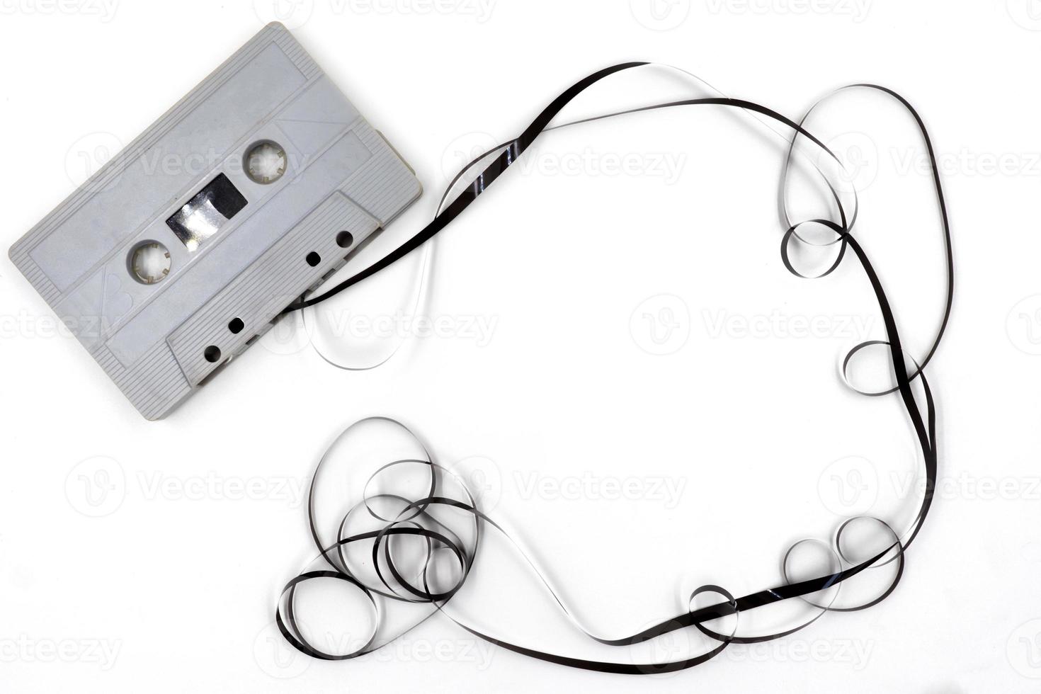Old cassette tape on white background. photo