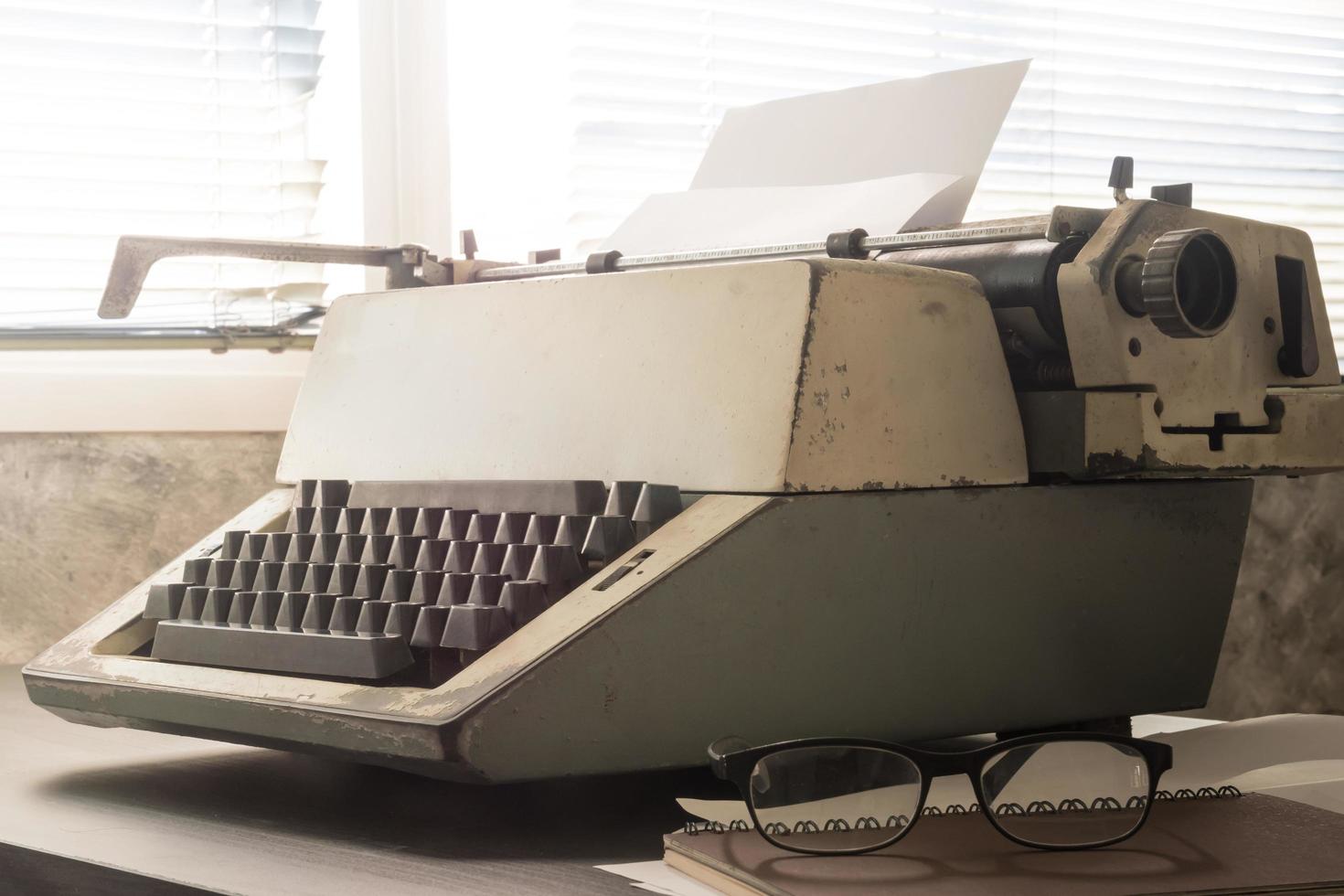Old Typewriter on the desk. Vintage tone photo