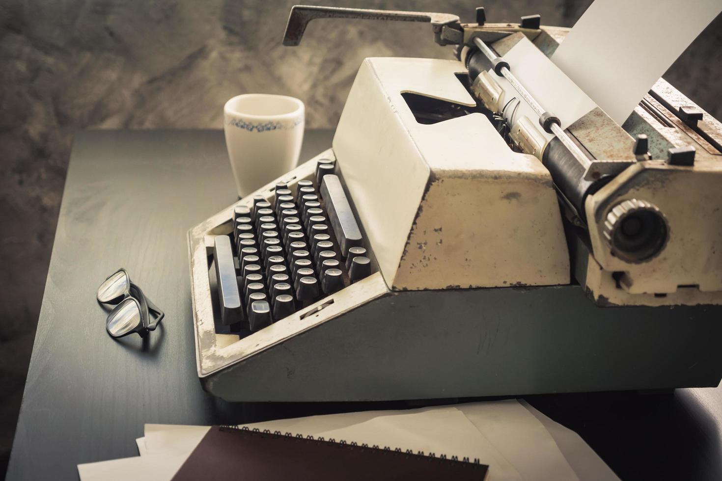 Old Typewriter on the desk. Vintage tone photo