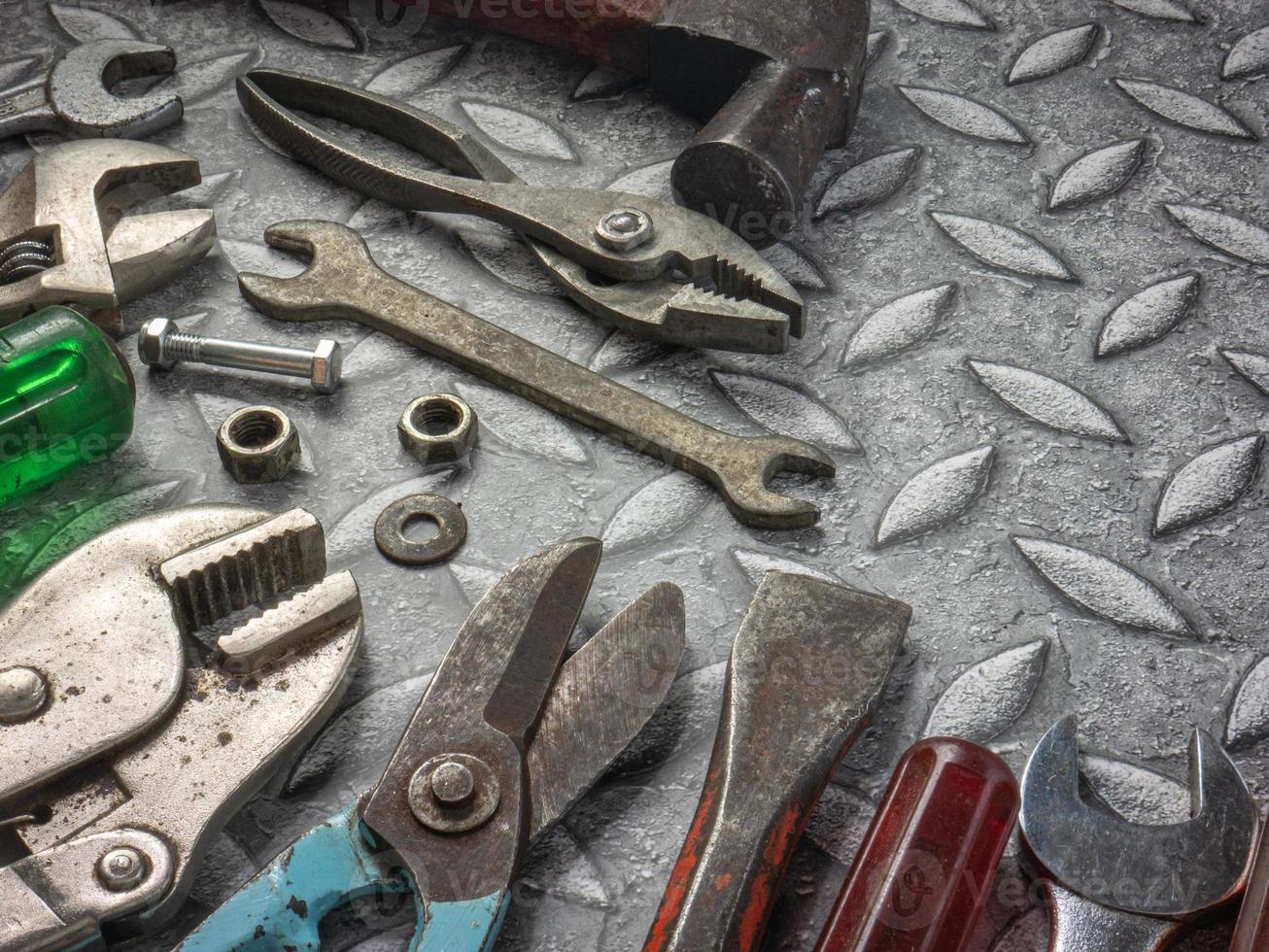 tools  on Checker plate  for safety  or engineer concept. photo