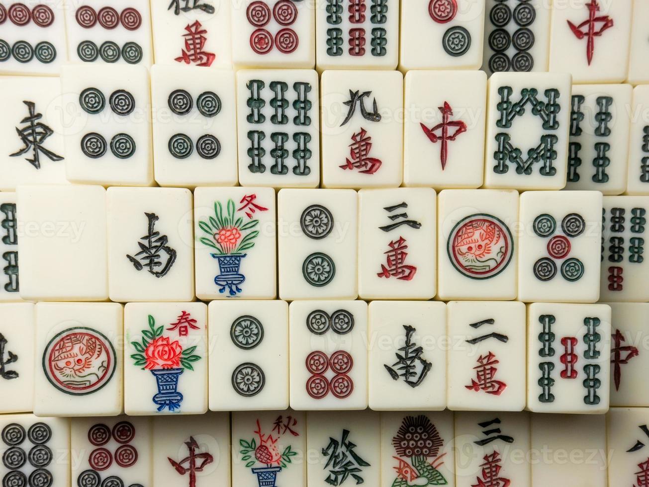 The mahjong on table ancient asian board game close up image photo
