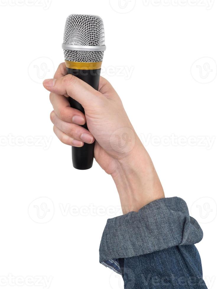 Male hand holding microphone on white background. photo