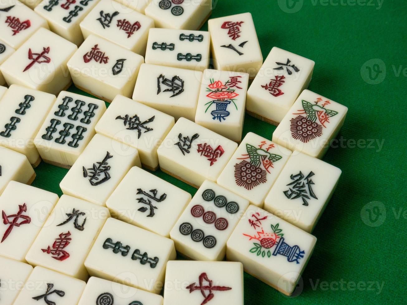 The mahjong on table ancient asian board game close up image photo