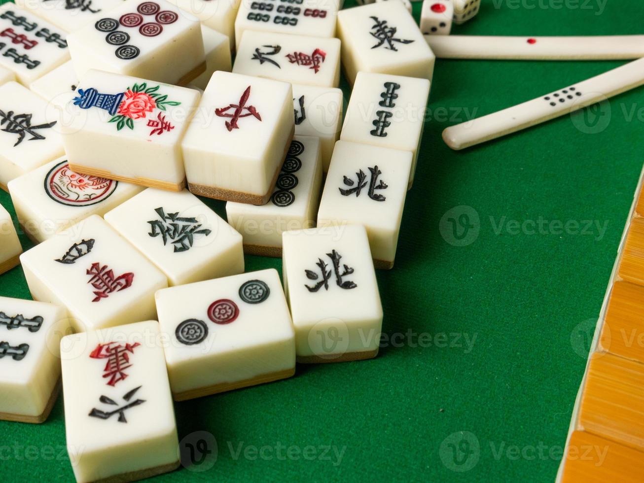 The mahjong on table ancient asian board game close up image photo