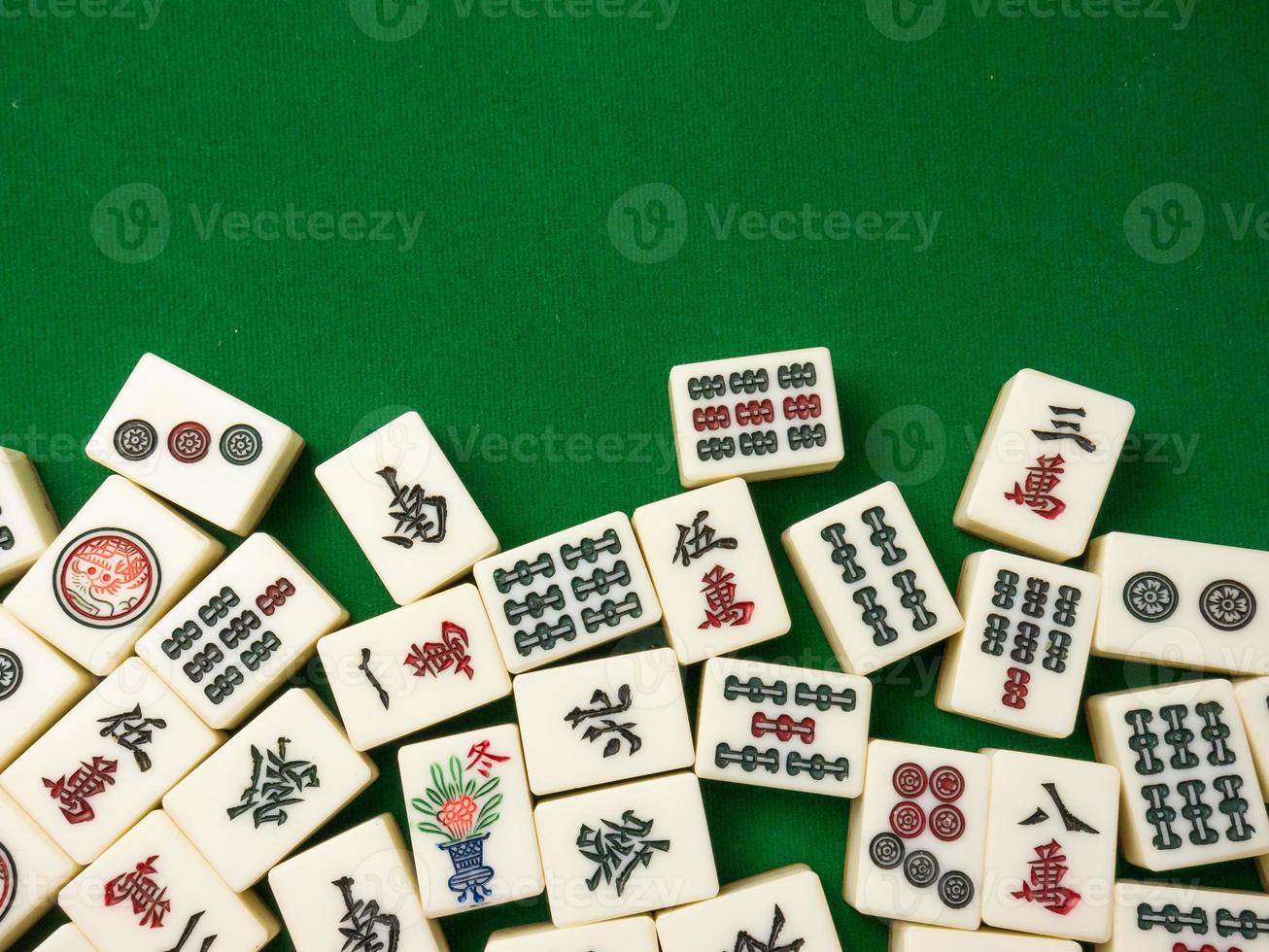 The mahjong on table ancient asian board game close up image photo