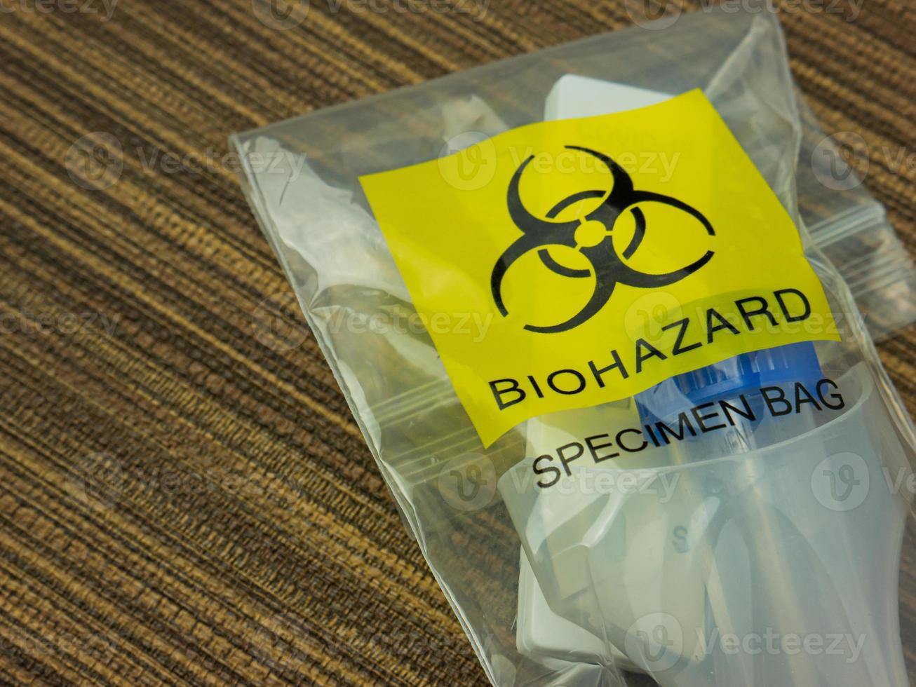 The  Antigen Test Kit in biohazard garbage for medical or sci concept photo