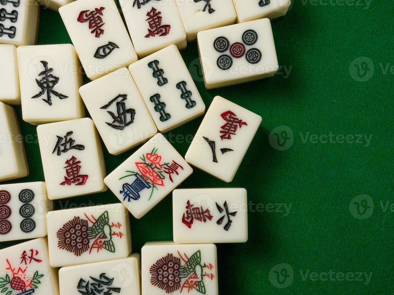 The mahjong on table ancient asian board game close up image photo