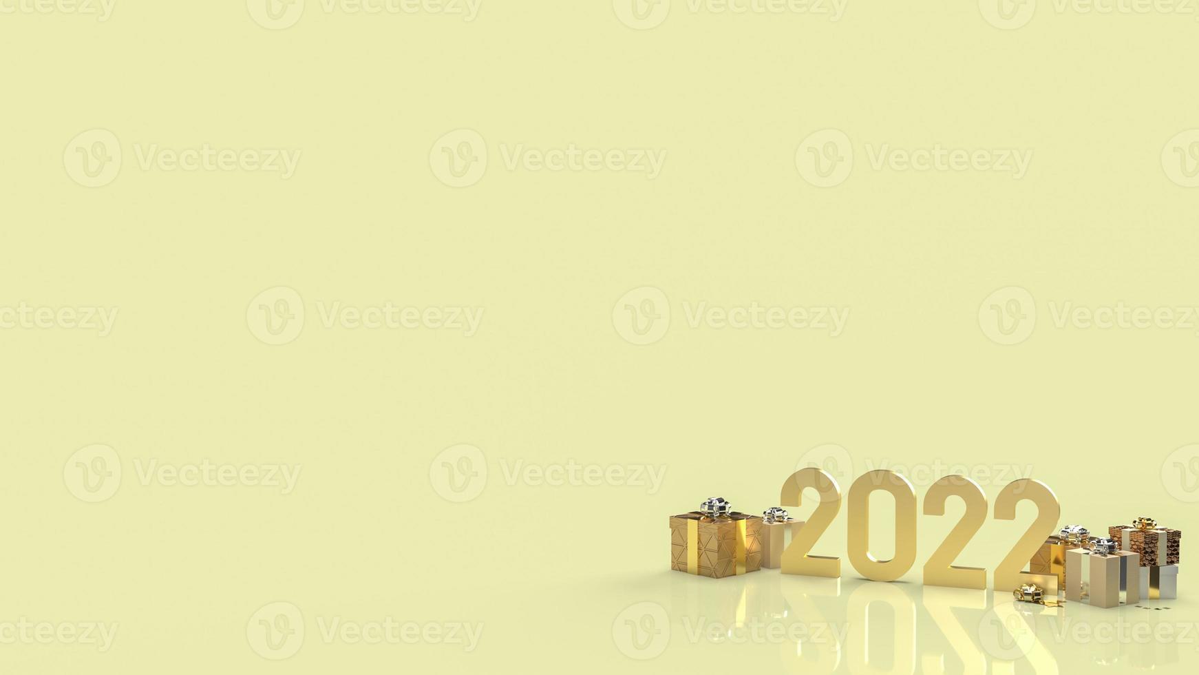el número de oro 2022 y la caja de regalo para la representación 3d del concepto de año nuevo. foto