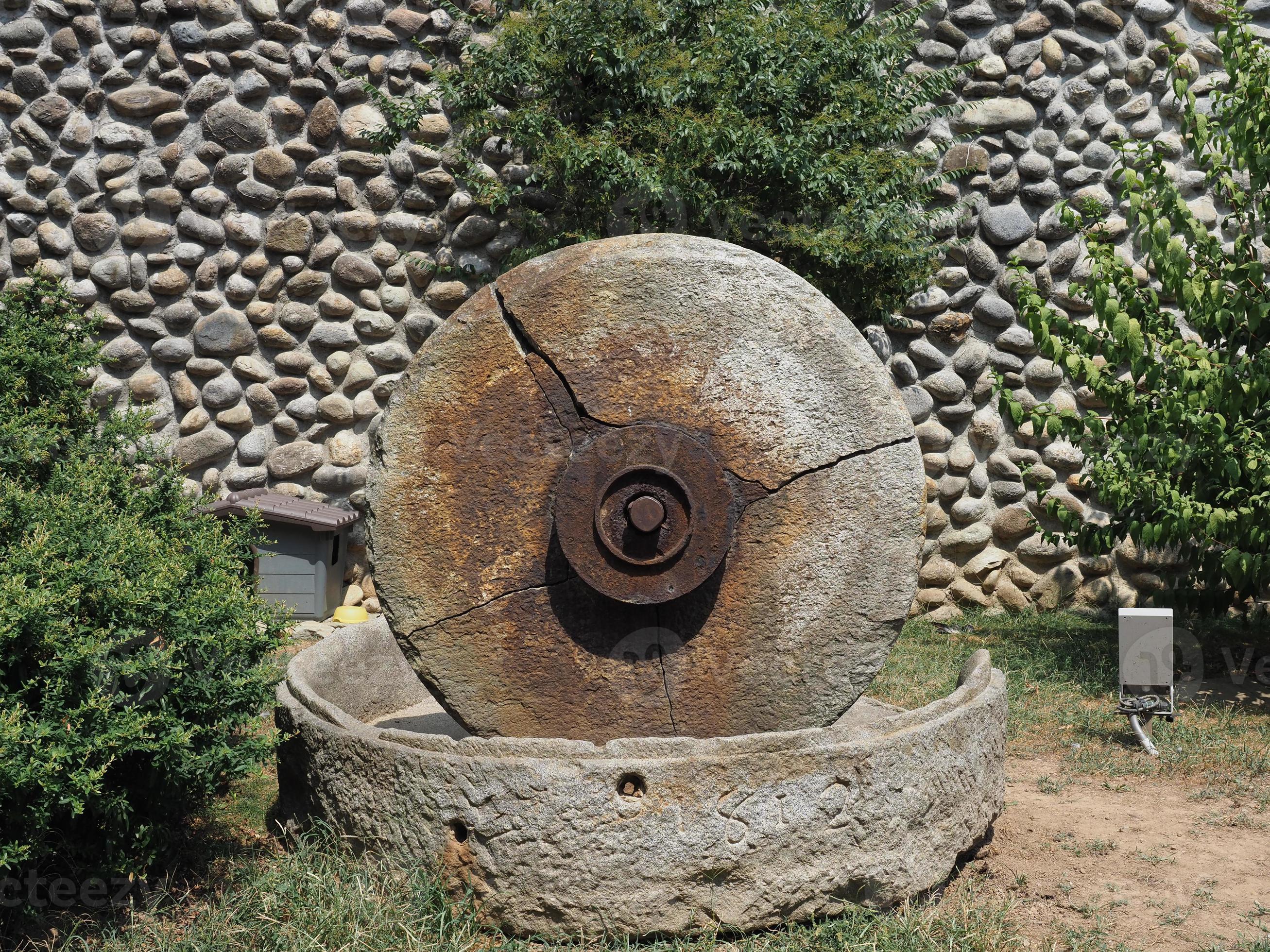 ancient mill millstone 10134179 Stock Photo at Vecteezy