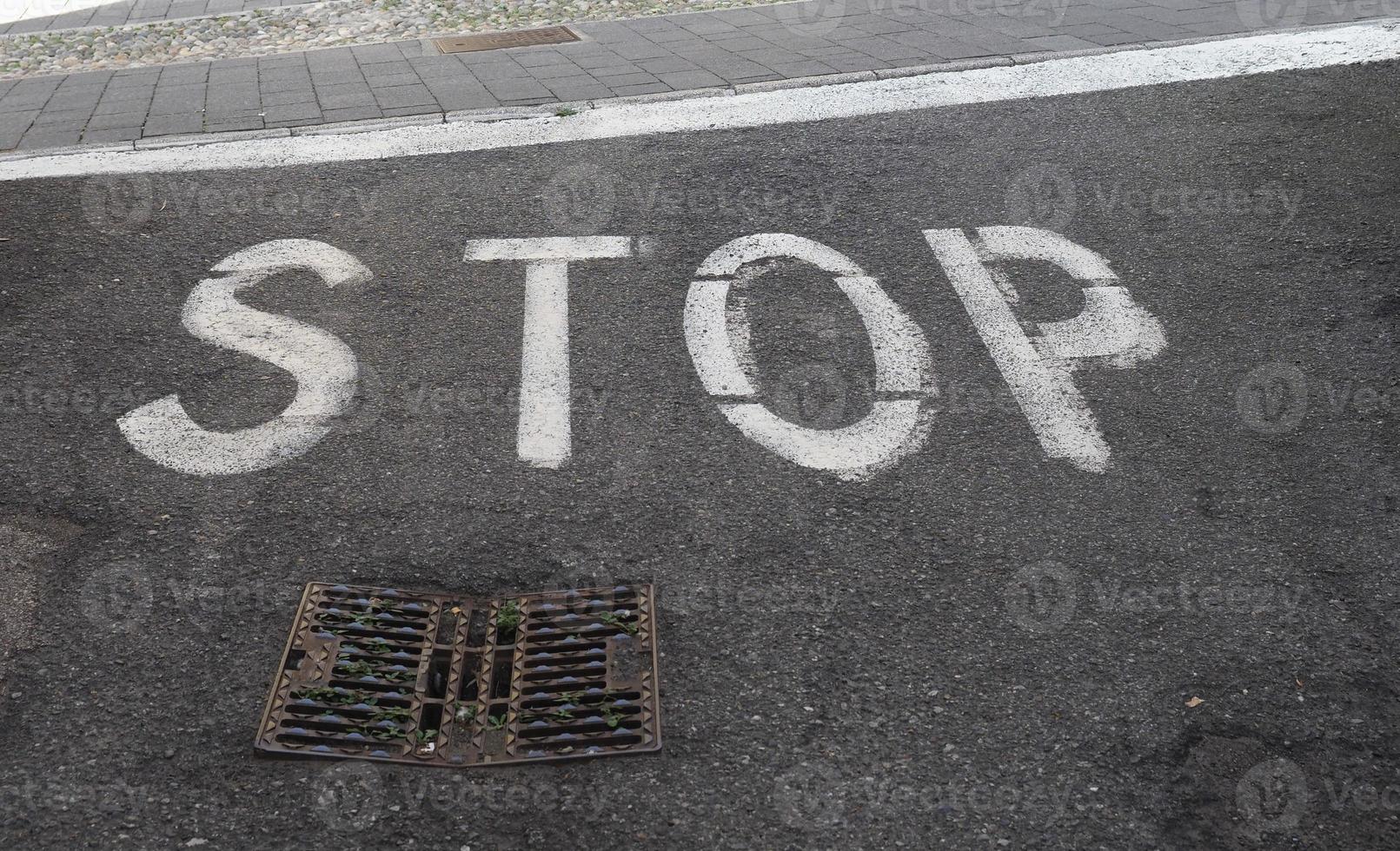 stop sign on tarmac photo