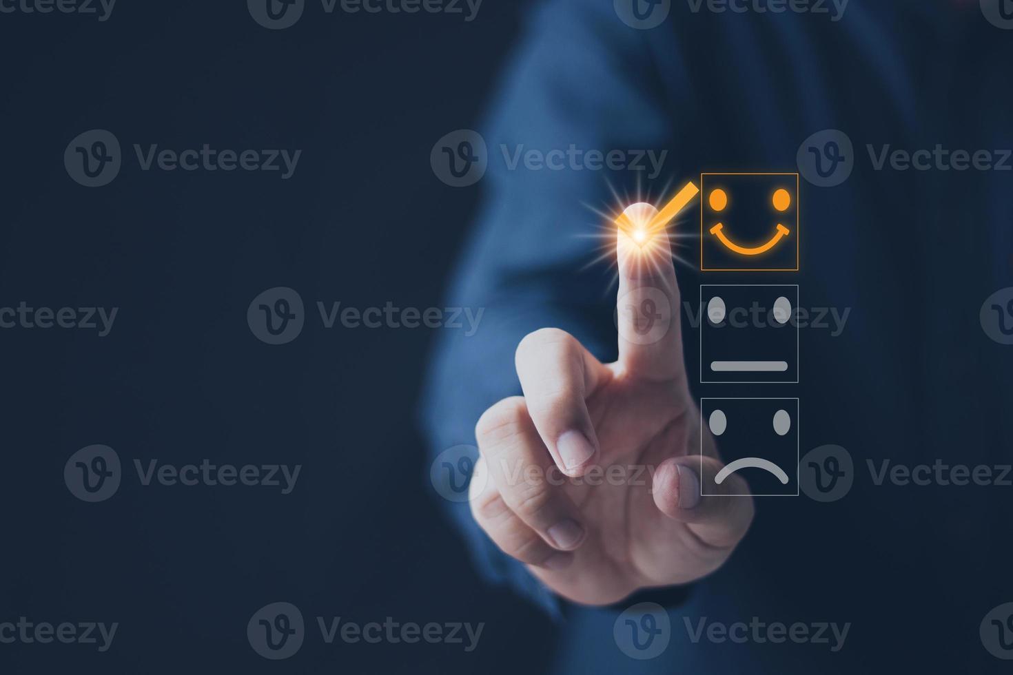 Customer service and Satisfaction concept Men's hands doing online assessments in the satisfaction rating the popular service company allows customers in order to improve and develop the organization photo