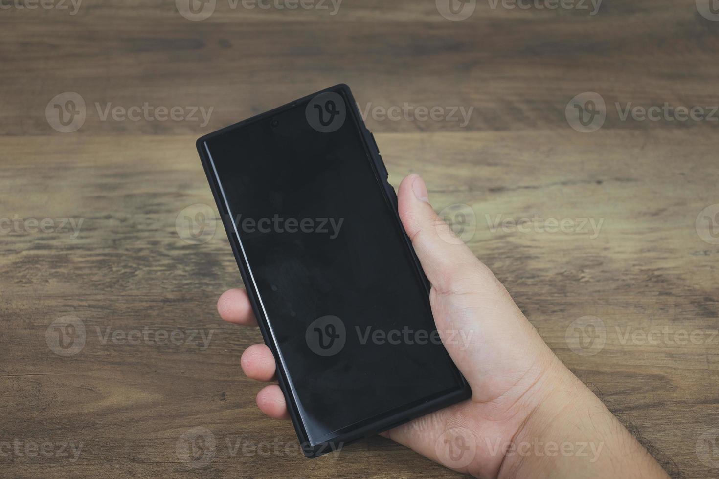 echnology concept social media man using smart phon access online media Through the Internet, there is marketing to answer customer chats. by working at home photo