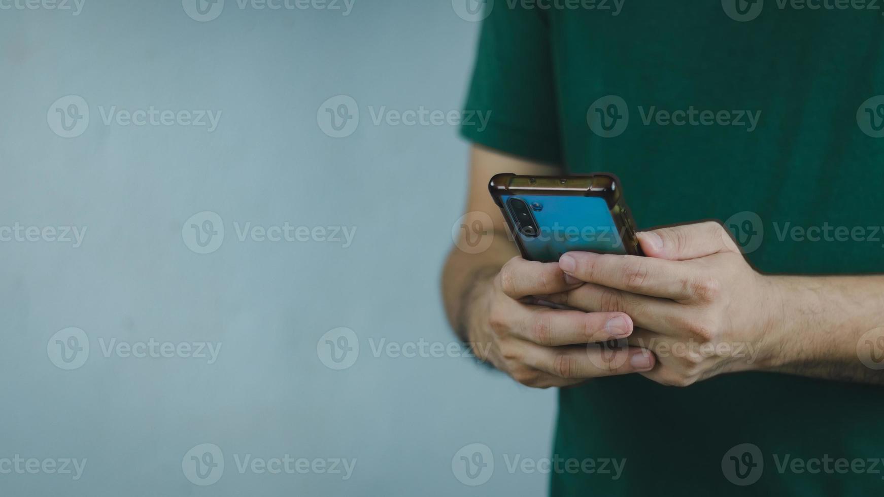 technology concept social media man using smart phon access online media Through the Internet, there is marketing to answer customer chats. by working at home photo