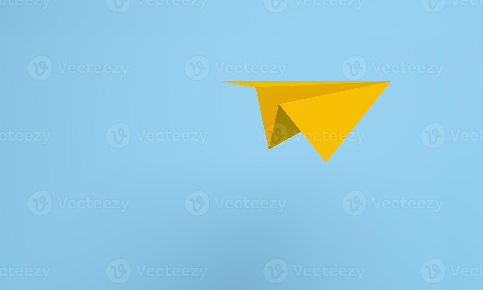 Isometric yellow paper airplane flying on blue background. photo